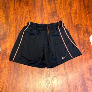 Nike men’s dri-fit athletic shorts, black w/ neon orange detail. Size XL.